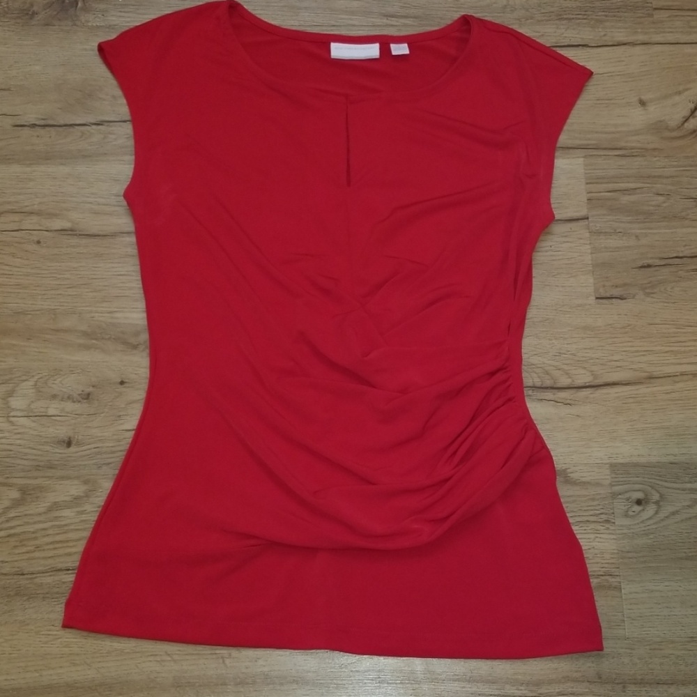 Sleeveless red blouse